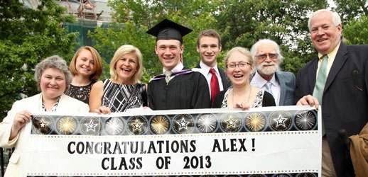 Alex Pajusi (BCom&#039;13) and family (Photo: Owen Egan)