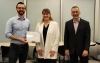 PhD student Filippo Dall'Olio receiving his PhD Teahing Excellence Award with Dean Isabelle Bajeux and PhD Program Director, Professor Samer Faraj.