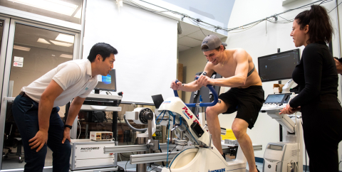 Researchers and an Exercise Bicycle