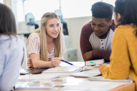 Young Researchers at a table