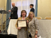 Kristy A. Robinson Receiving an AERA Award