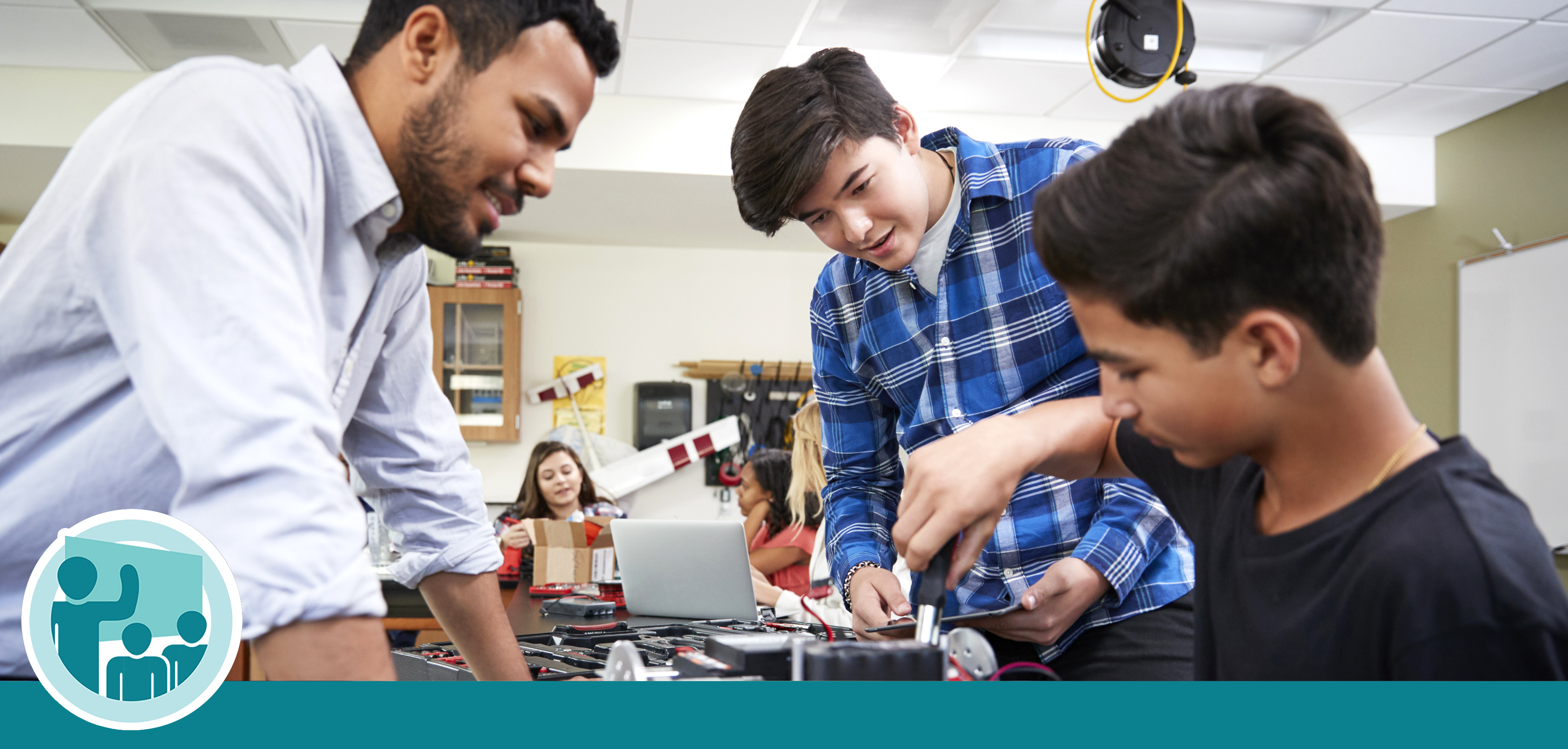 Teacher with tech students