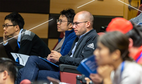 Students listening attentively in an university lecture hall