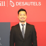 man looking at camera smiling