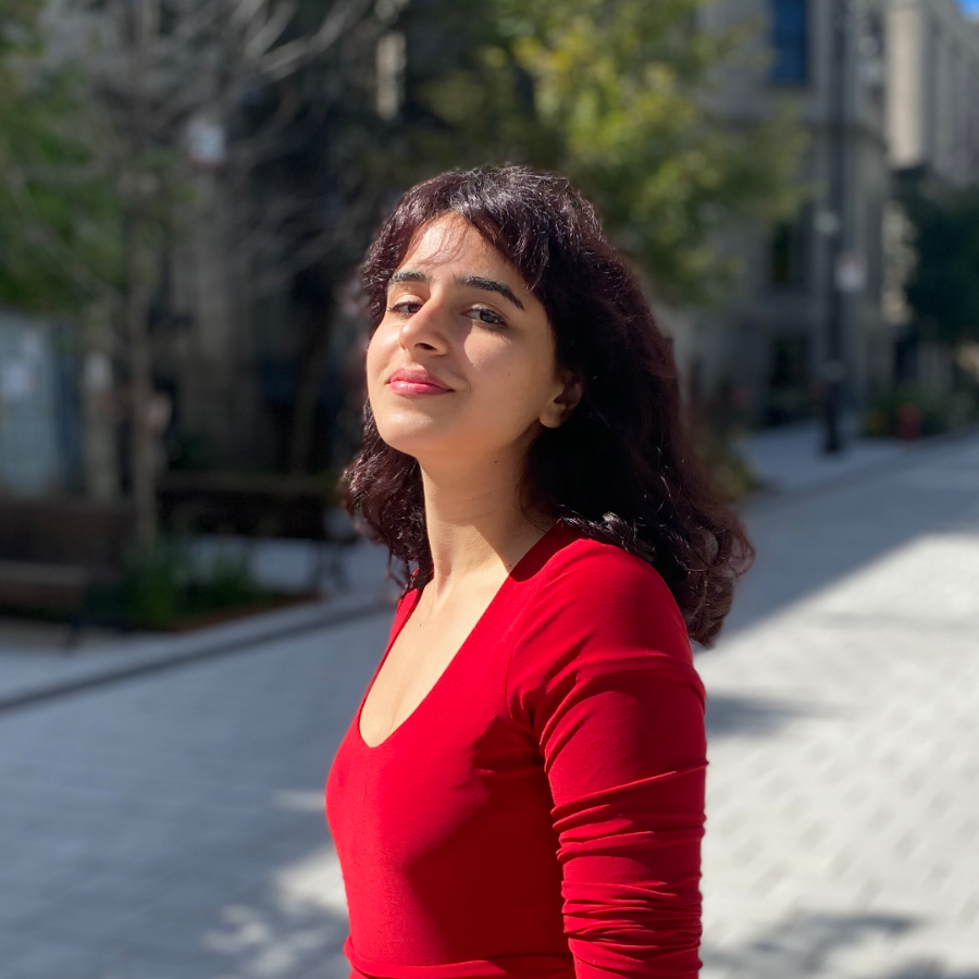 Woman in red smiling
