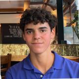 man looking at camera smiling