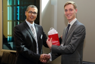 2015 SURE Faculty Prize winner Antonio Colantuoni,  Department of Chemical Engineering, posing for photo with presenter