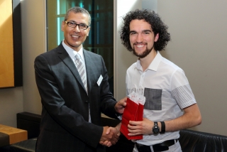 2015 SURE Faculty Prize winner Sean Fielding,  Department of Mechanical Engineering, posing for photo with presenter