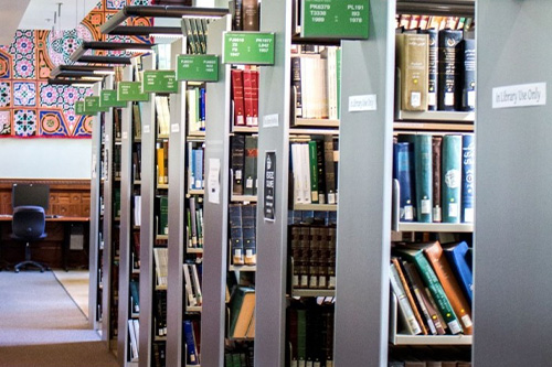 bookshelves filled with books in McGill Library