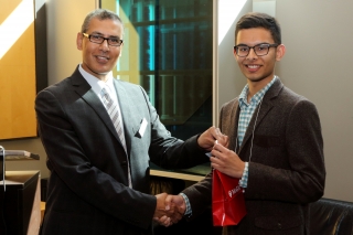 2015 SURE Faculty Prize winner Aagnik Pant,  Department of Electrical and Computer Engineering, posing for photo with presenter
