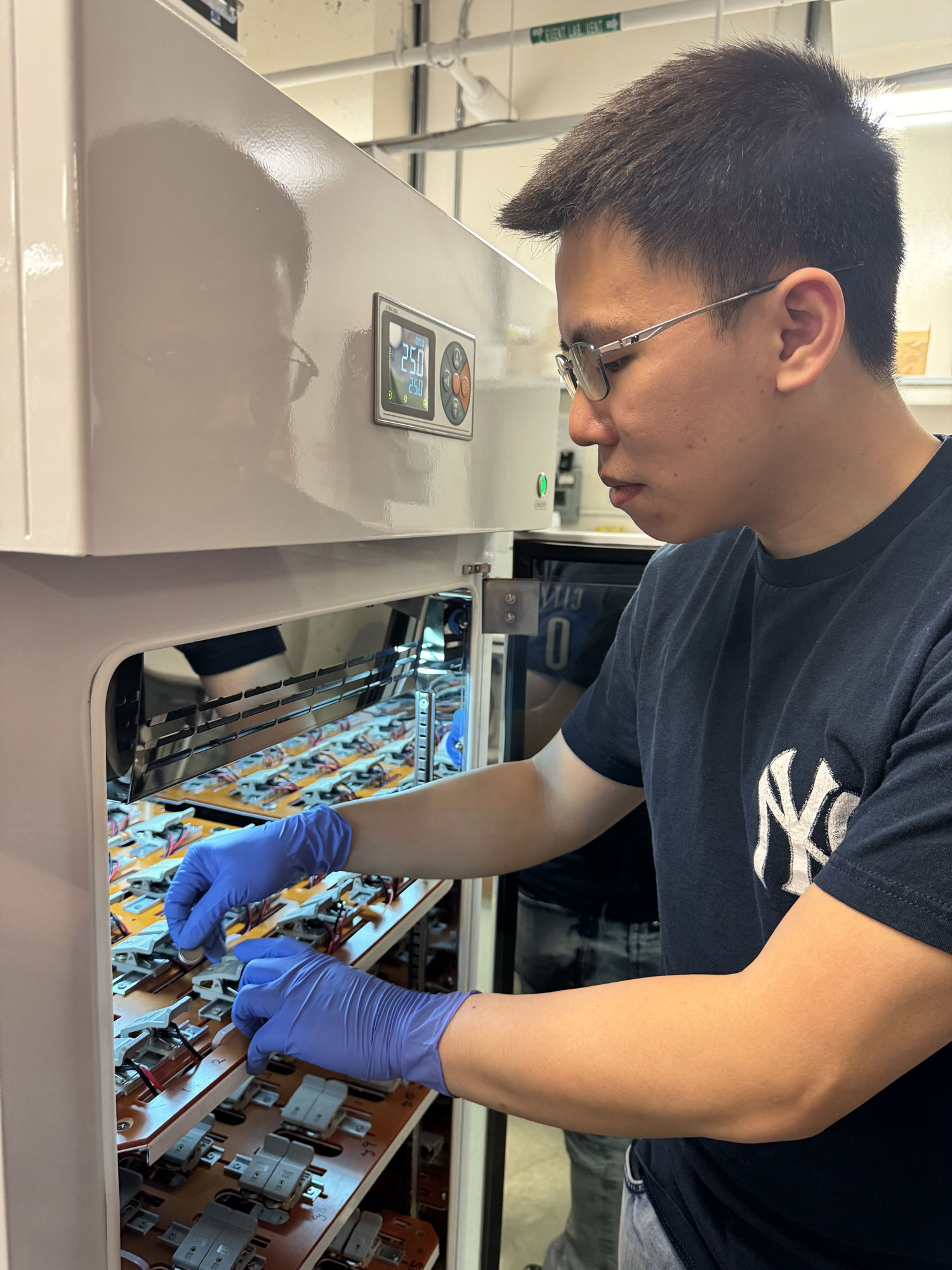 Richie Fong working in a lab