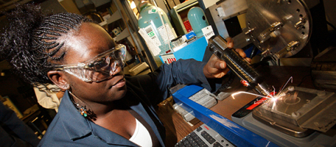 A student working with equipments in laboratory