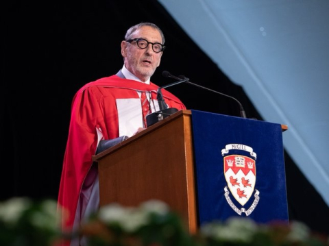 Image of Alumni giving speech at honorary graduation