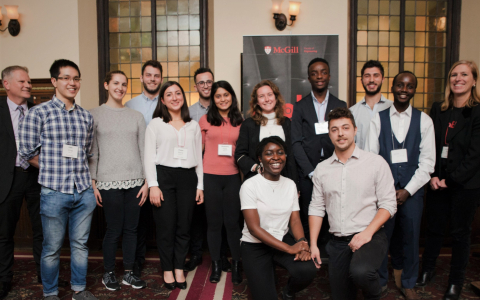 Group of students posing for photo at event