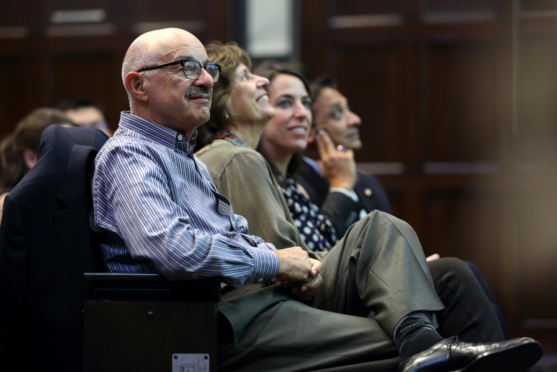 McGill alumnus Les Vadasz and 3 other people focusing on an ongoing presentation