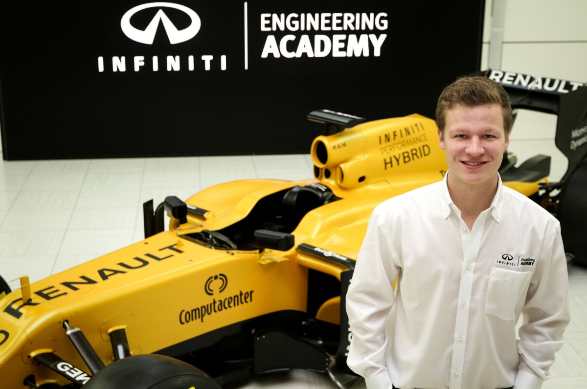 Félix Lamy in front of a race car