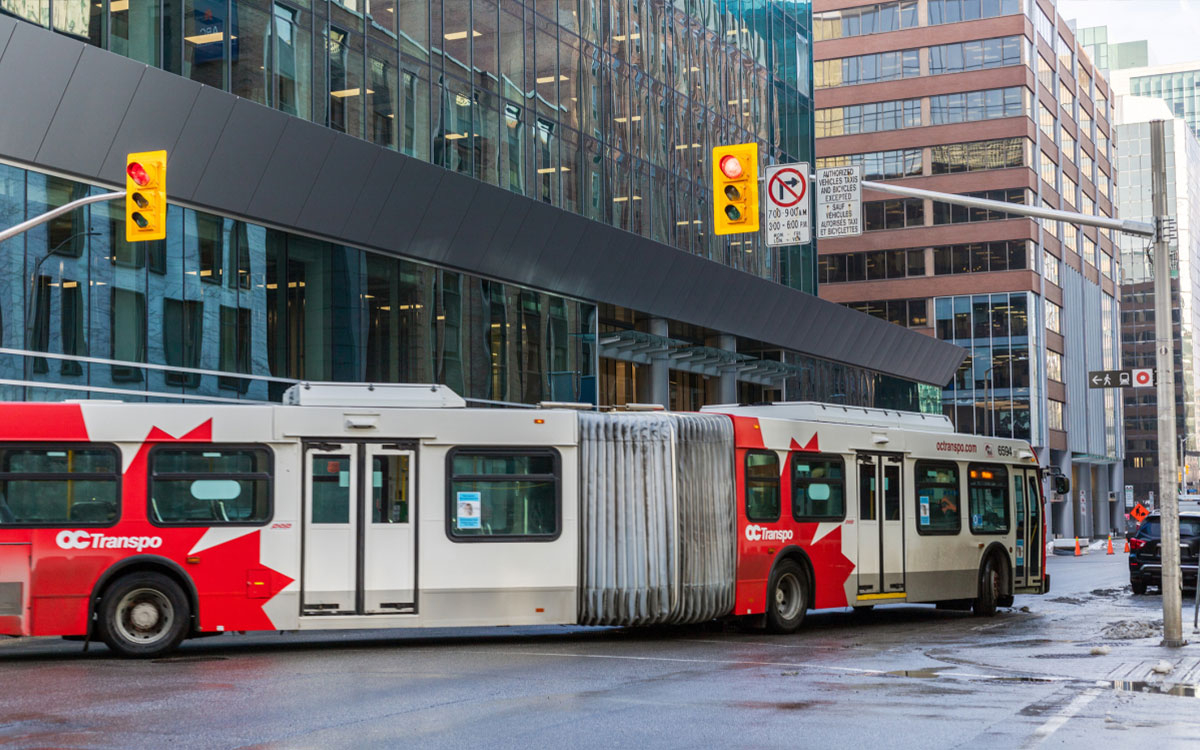 a bus making a turn at a traffic light
