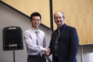 2017 SURE TISED Prize winner Kuan Wei,  Department of Chemical Engineering, posing for photo with presenter