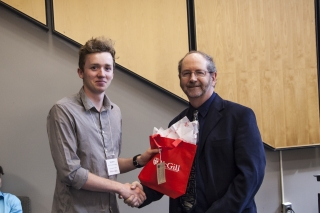 2017 SURE Faculty Prize winner Tim Ryan, Trinity College Dublin, posing for photo with presenter