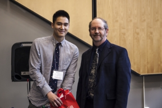 2017 SURE Faculty Prize winner Joseph Lu, Department of Mechanical Engineering, posing for photo with presenter
