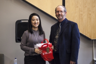2017 SURE Faculty Prize winner Tianshuang (Sarah) Qiu, Department of Mechanical Engineering, posing for photo with presenter