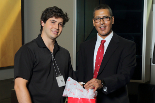 2016 SURE Faculty Prize winner Gabriel Langlois-Rahme,  Department of Chemical Engineering, posing for photo with presenter