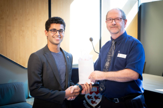 2018 SURE TISED Prize winner Hemanshu Anand, Department of Chemical Engineering, posing for photo with presenter
