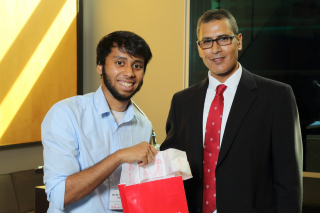 2016 SURE Faculty Prize winner Sheikh Saad Salah Uddin,  Department of Electrical &amp; Computer Engineering, posing for photo with presenter