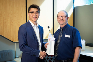 2018 SURE Faculty Prize winner Tony Ye, posing for photo with presenter