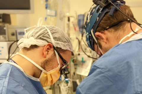 Closeup of two surgeons