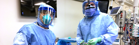 Closeup of surgeons wearing PPE