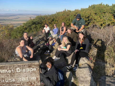 Students gather as a group at the Gault Nature Reserve