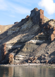 A dyke associated with the North Atlantic Igneous Province cutting though a sedimentary basin in West Greenland.