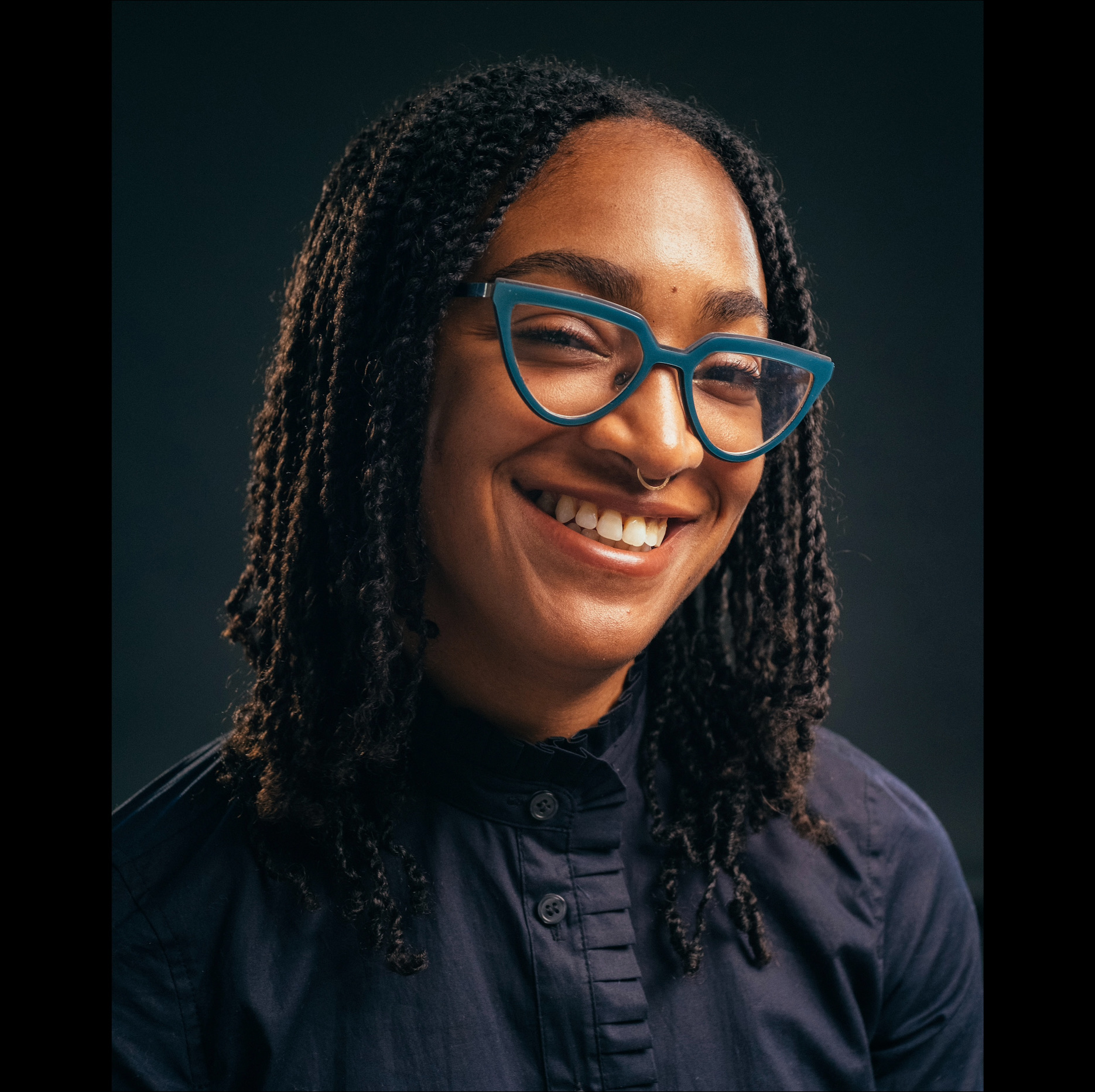 Amber Rose Johnson, a black woman with braided hairstyle.