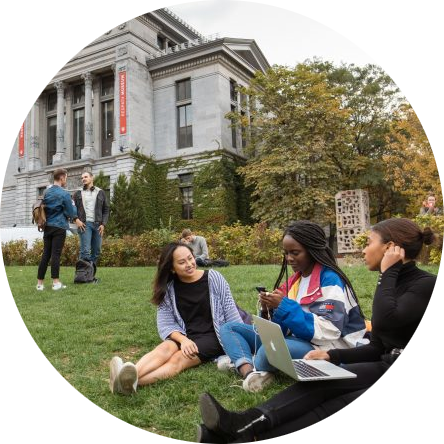 Students sitting on the McGill lawn