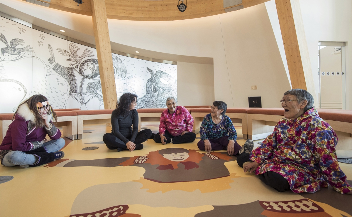Indigenous elders sitting in a circle