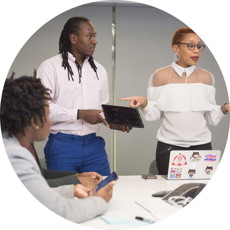 Three people in a meeting