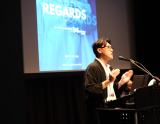 Photo of Kevin Ah-Sen speaking at a podium
