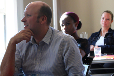 Staff sitting in a lecture room