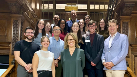 Professor Poirier and her students in front of Old Chancellor Day Hall