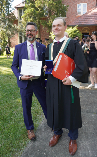 Connor Velthuis receiving MAPAQ's Medaille d'Or.