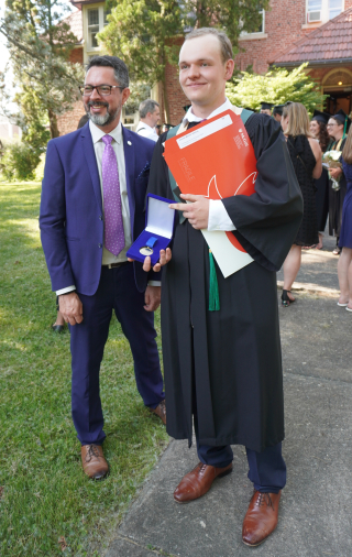 Connor Velthuis receiving the Governor General Collegiate Bronze Medal