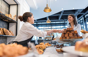 Serving a student at a retail location