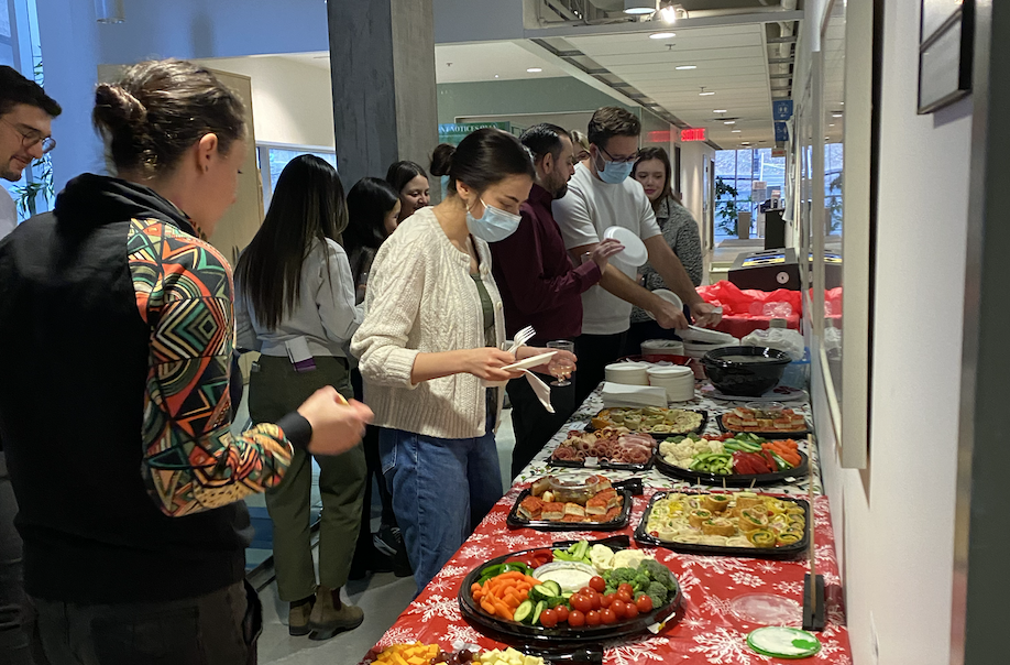 People taking food from the event