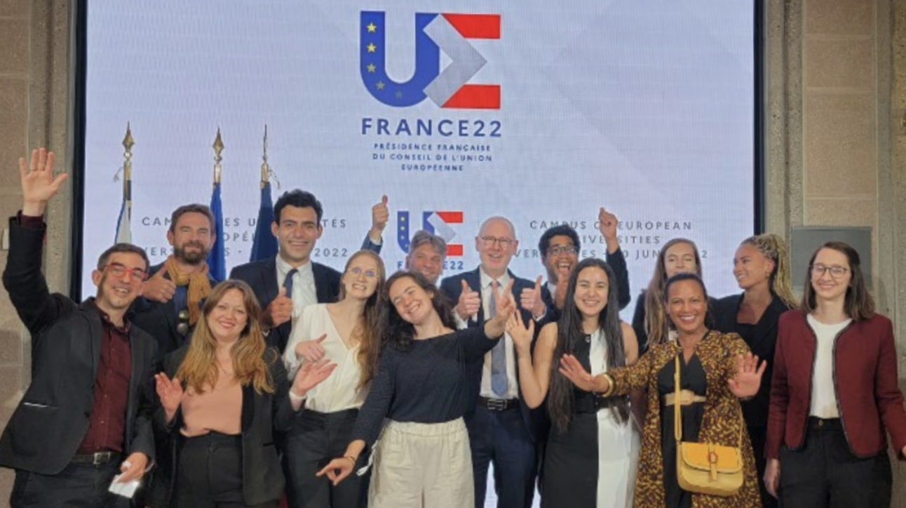 Group photo of Patrick and others at the France22 conference