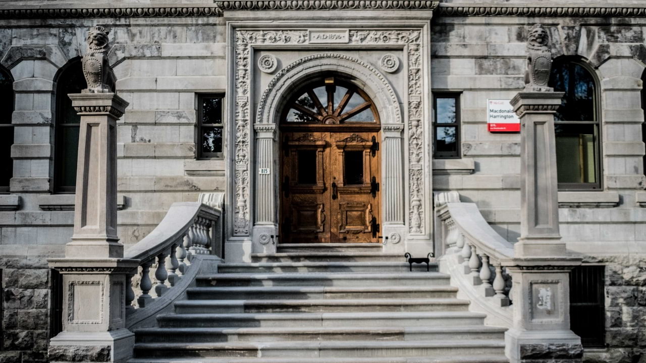 stone front steps and entrance way of the Macdonald Harrington building