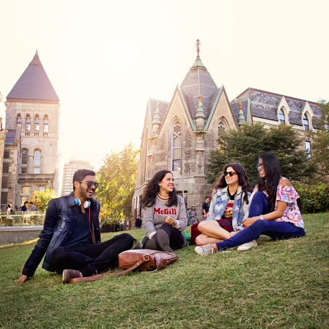 student sitting outside on McGill campus