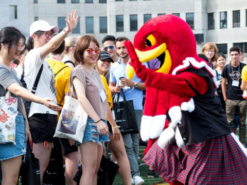 Students at Discover McGill with Marty Martlet Mascot