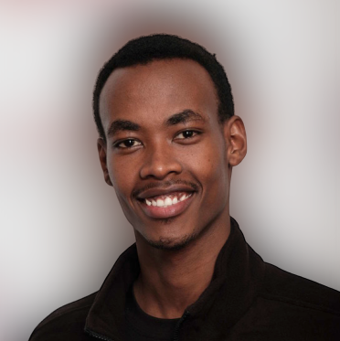 Elie Mandela - Young black man with short hair and a black shirt