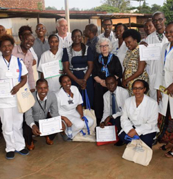 Group of medical personel holding certificates